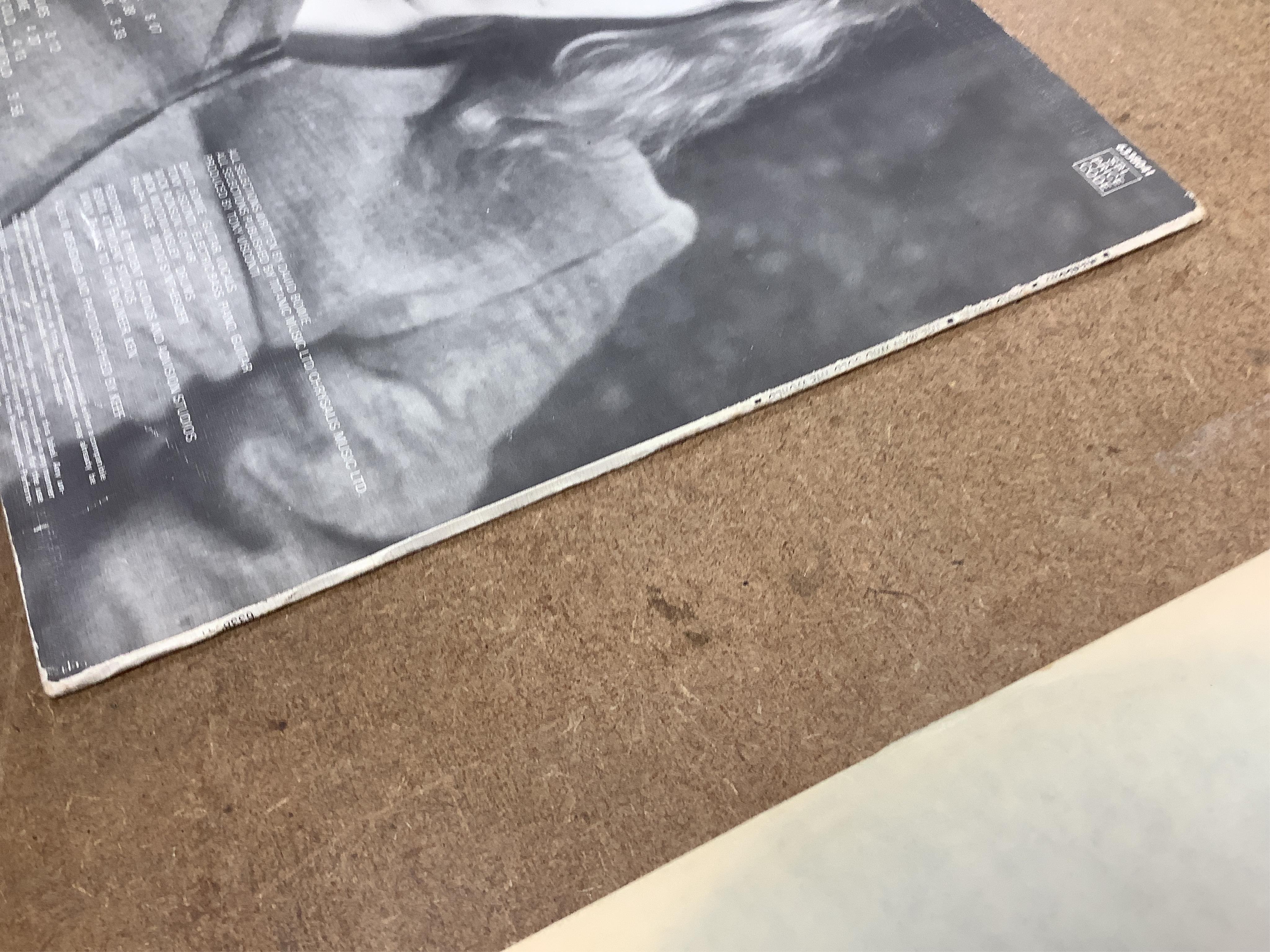 David Bowie, The Man Who Sold the World, 1971 LP record album, on Mercury label, 6338 041, in the scarce cover with Bowie wearing a dress and lying on a chaise lounge